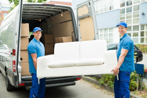 Moving van and packed boxes representing a transparent Elephant and Castle removals quote
