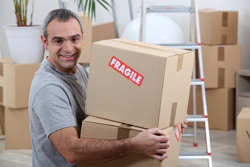 Wardrobe boxes and fragile-item packaging ready for moving day