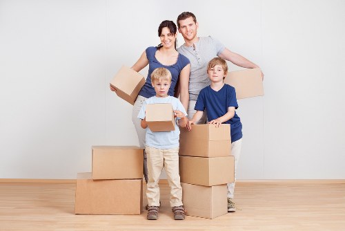 Loading household items into a removals van