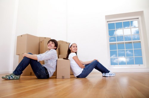 Loading household furniture into a van in South London