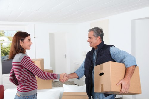 Loading boxes and furniture into a moving van in South London