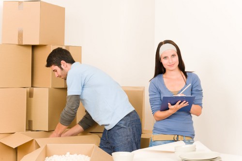 Professional bulky furniture collection with access challenges in city flats