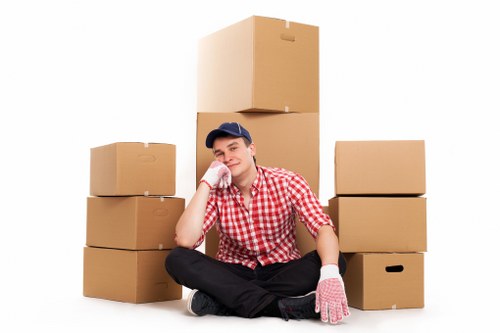 Careful loading of student belongings for a move in South London
